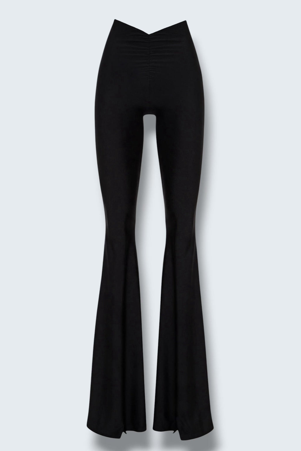 The Saint 54 Muse trousers in black stretch fabric with a high waist, flared legs, and inner seam slits.