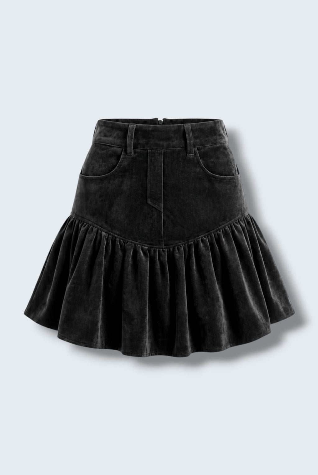The Saint 54 black suede bomber jacket and ruffled mini skirt set worn by a model against a white background.