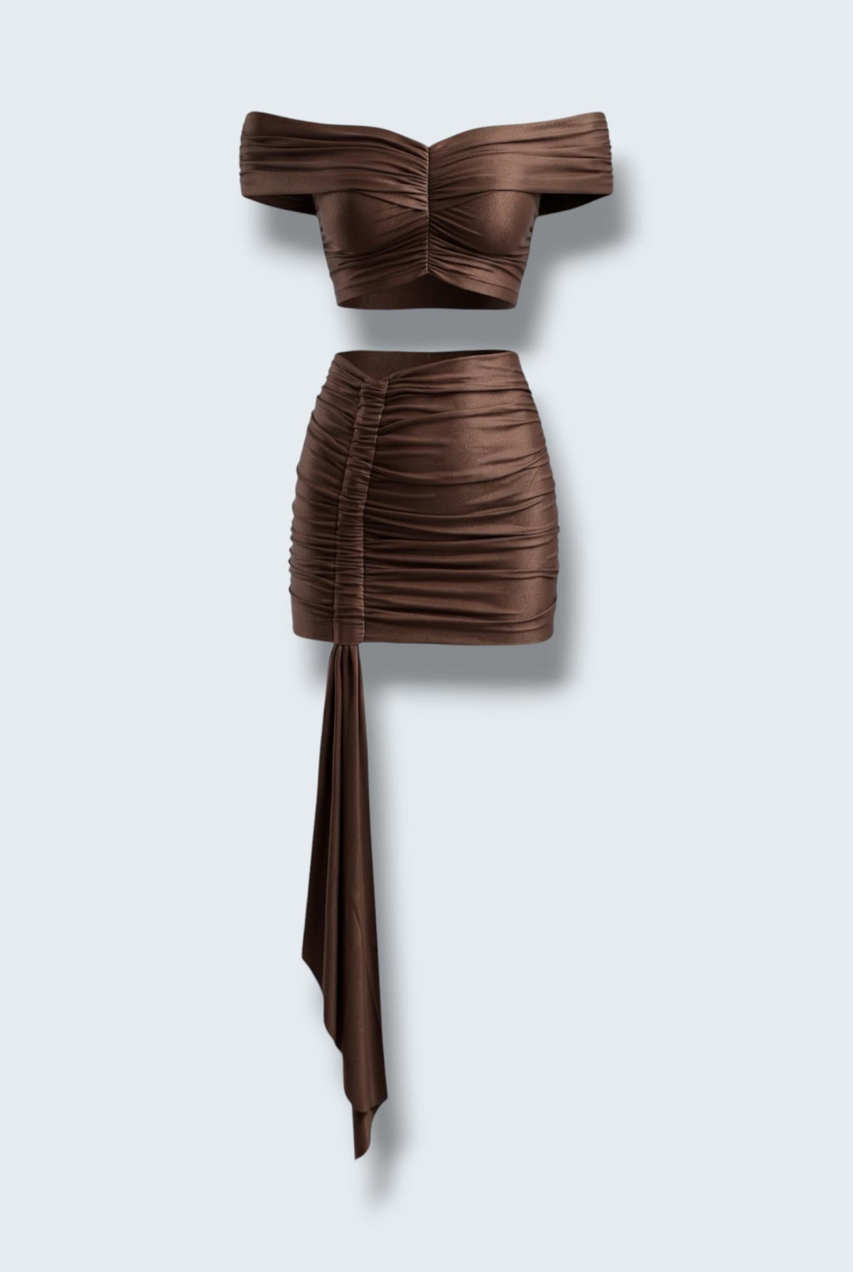 The Saint 54 brown two-piece set with off-shoulder cropped top and high-waisted ruched mini skirt with scarf detail.